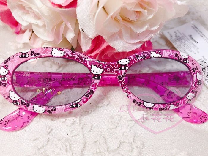 ♥小花花日本精品♥Hello Kitty 凱蒂貓紫色滿版蝴蝶結圖案兒童墨鏡抗UV太陽眼鏡56873207
